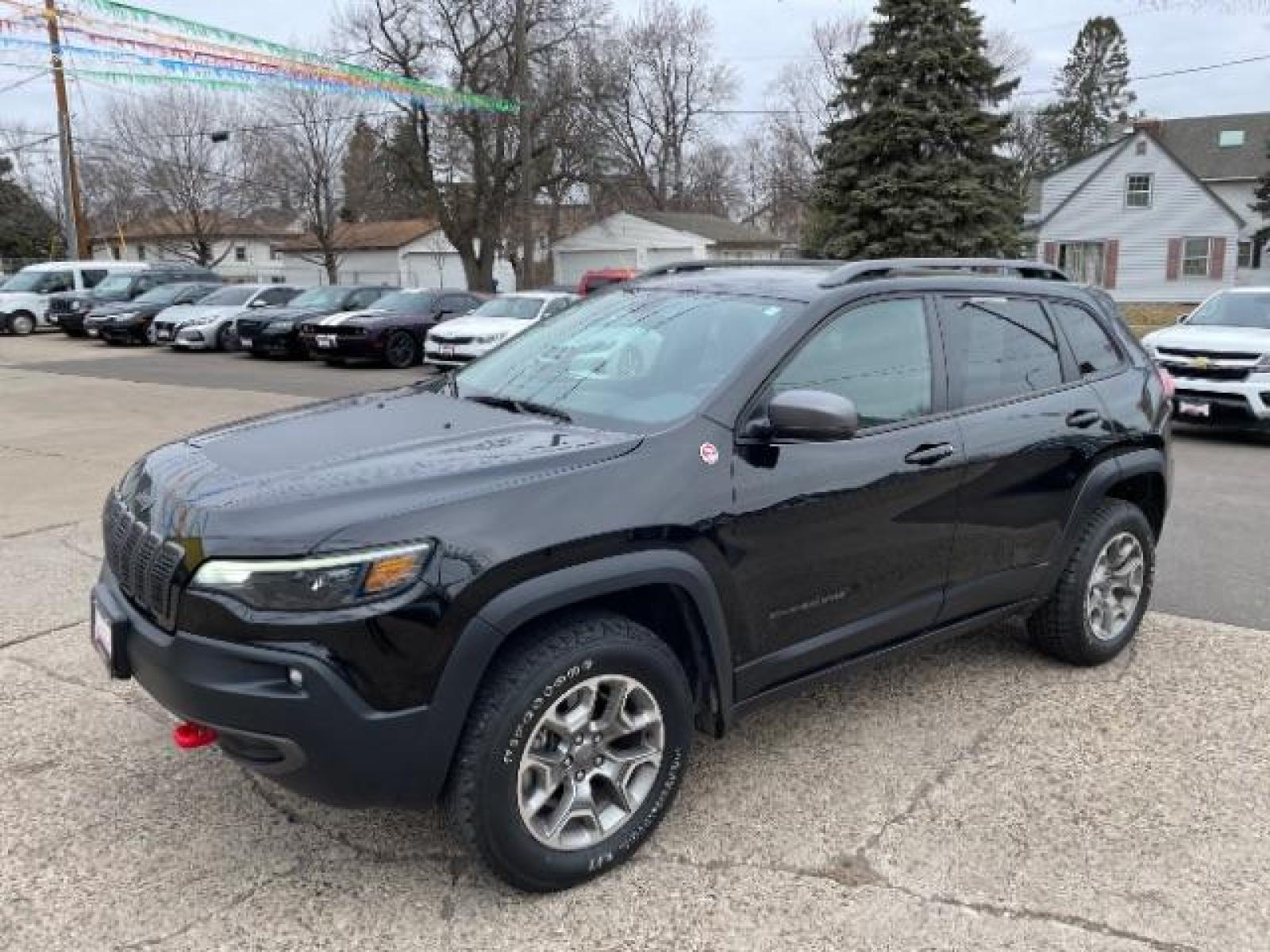 2020 Diamond Black Crystal Pearl Coat Jeep Cherokee Trailhawk 4WD (1C4PJMBN0LD) with an 2.0L L4 DOHC 16V TURBO engine, 9-Speed Automatic transmission, located at 745 S Robert St, St. Paul, MN, 55107, (651) 222-2991, 44.923389, -93.081215 - Photo #0