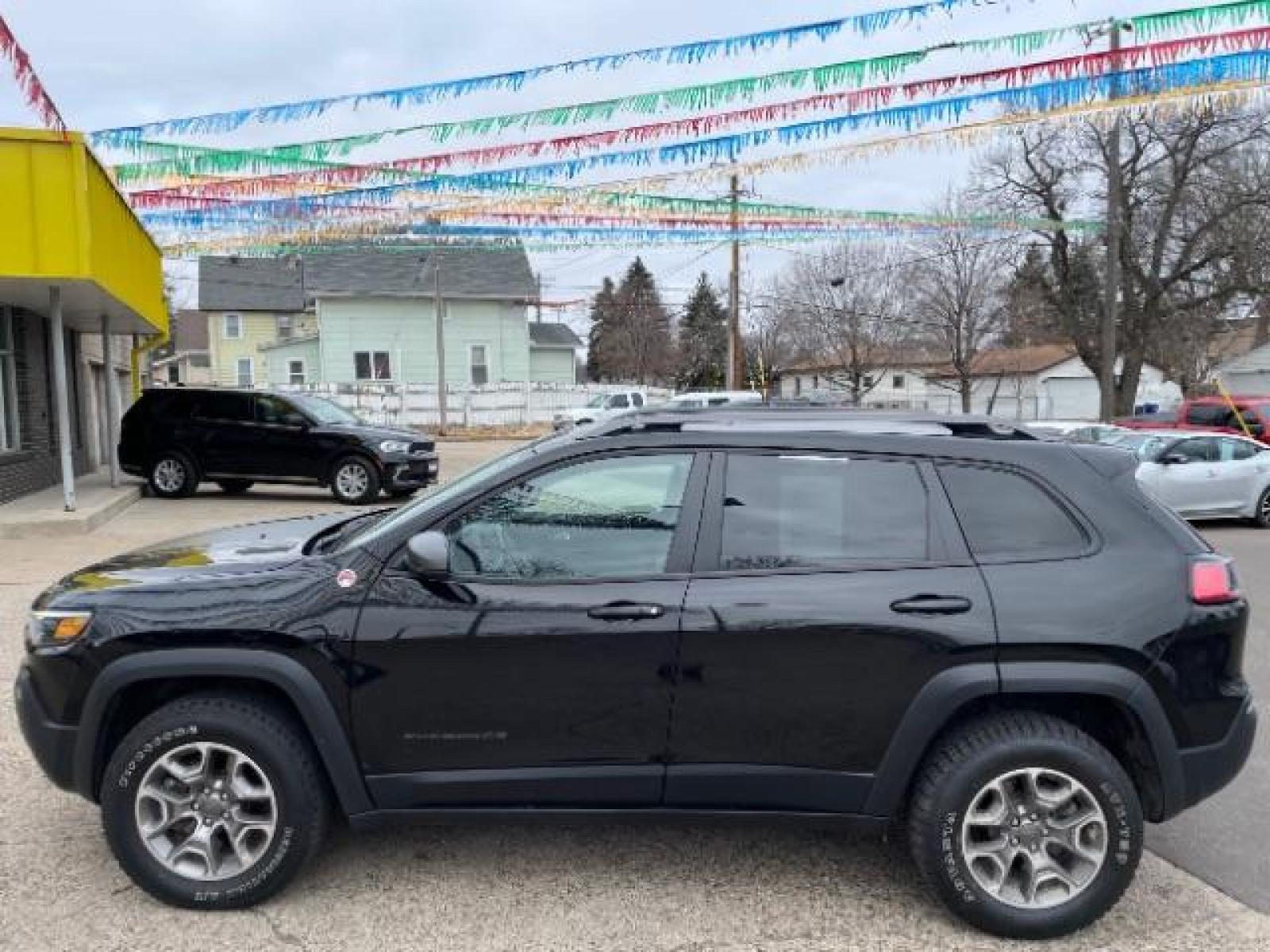 2020 Diamond Black Crystal Pearl Coat Jeep Cherokee Trailhawk 4WD (1C4PJMBN0LD) with an 2.0L L4 DOHC 16V TURBO engine, 9-Speed Automatic transmission, located at 745 S Robert St, St. Paul, MN, 55107, (651) 222-2991, 44.923389, -93.081215 - Photo #1